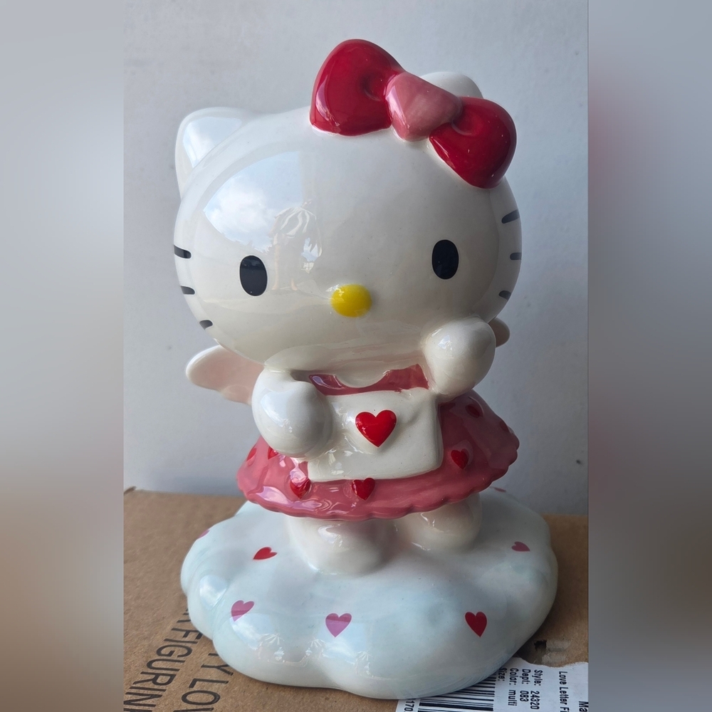 Ceramic Figurine with Red Accents